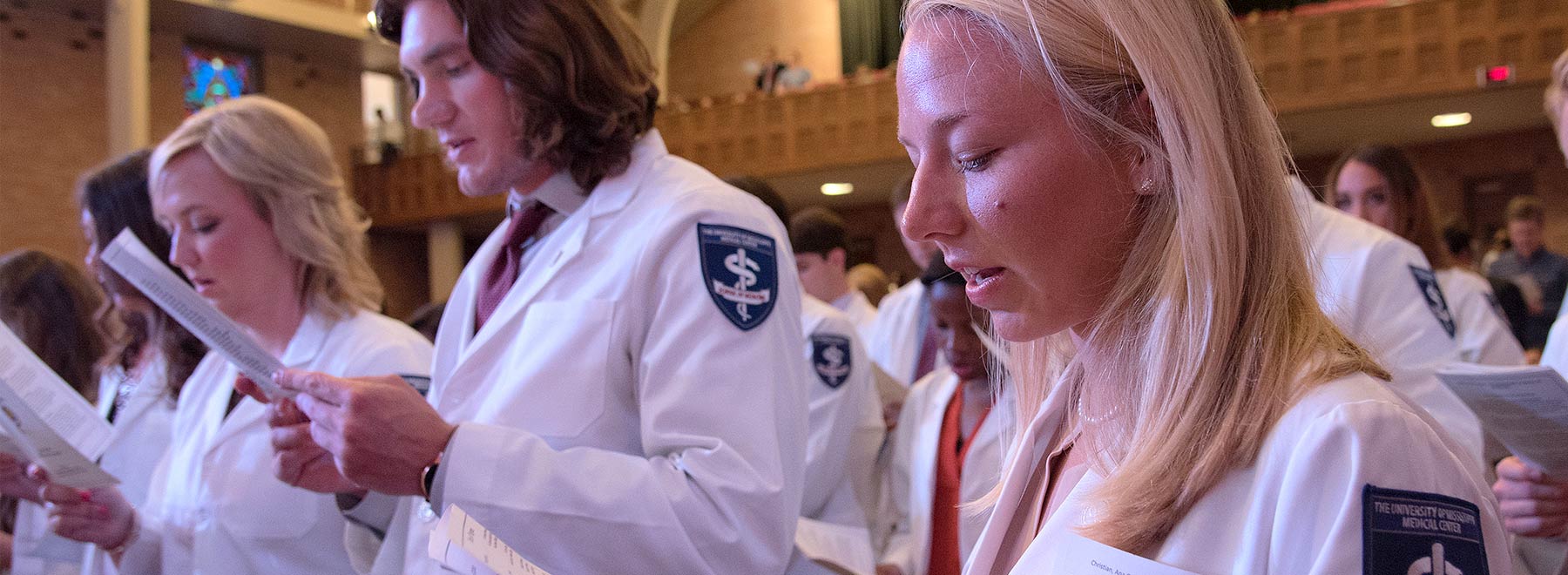 Medical students reciting Hippocratic oath